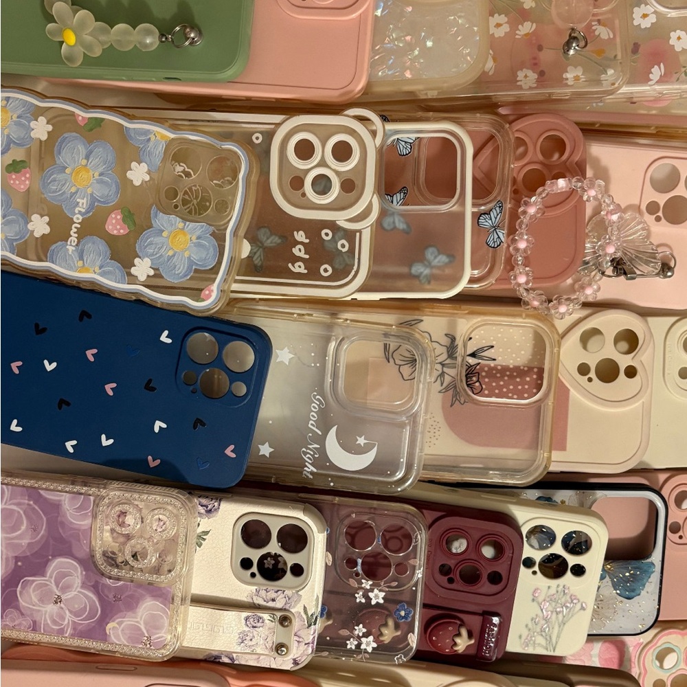 Colorful smartphone cases with floral patterns and camera protection